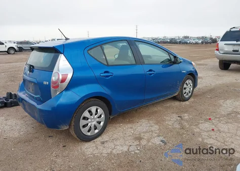 2014 Toyota Prius C One from USA, damaged, VIN JTDKDTB39E1083614